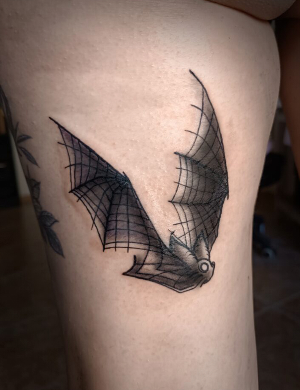 Tatuaje en negro murciélago